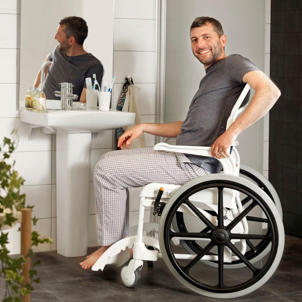 Etac Clean 24″ Self Propelled Mobile Shower Commode Chair