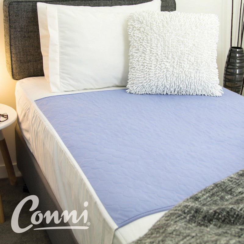 Conni Bed Pad with Tuck-ins