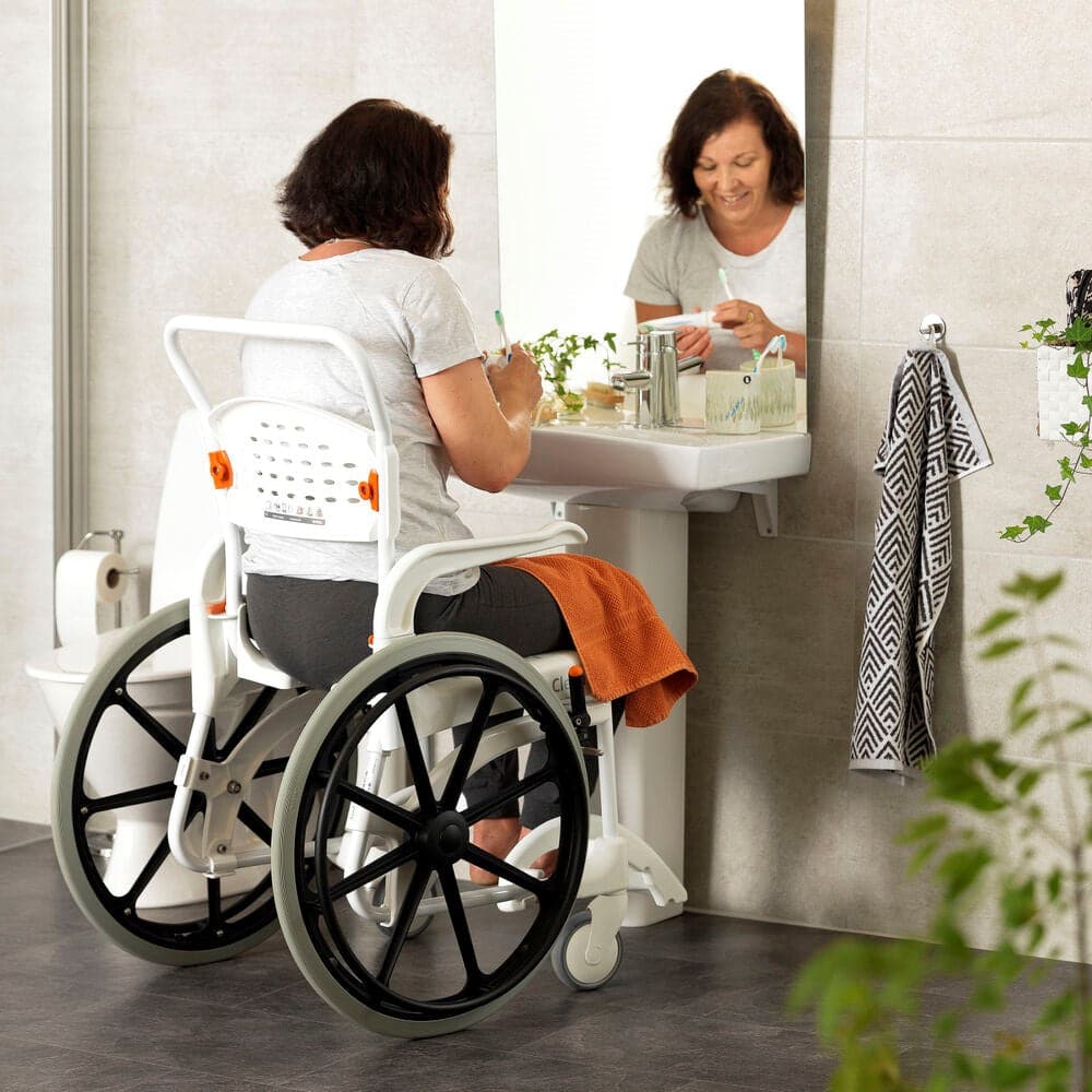 Etac Clean 24″ Self Propelled Mobile Shower Commode Chair